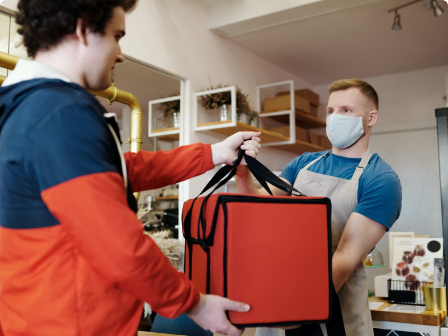 A customer making a payment at the counter