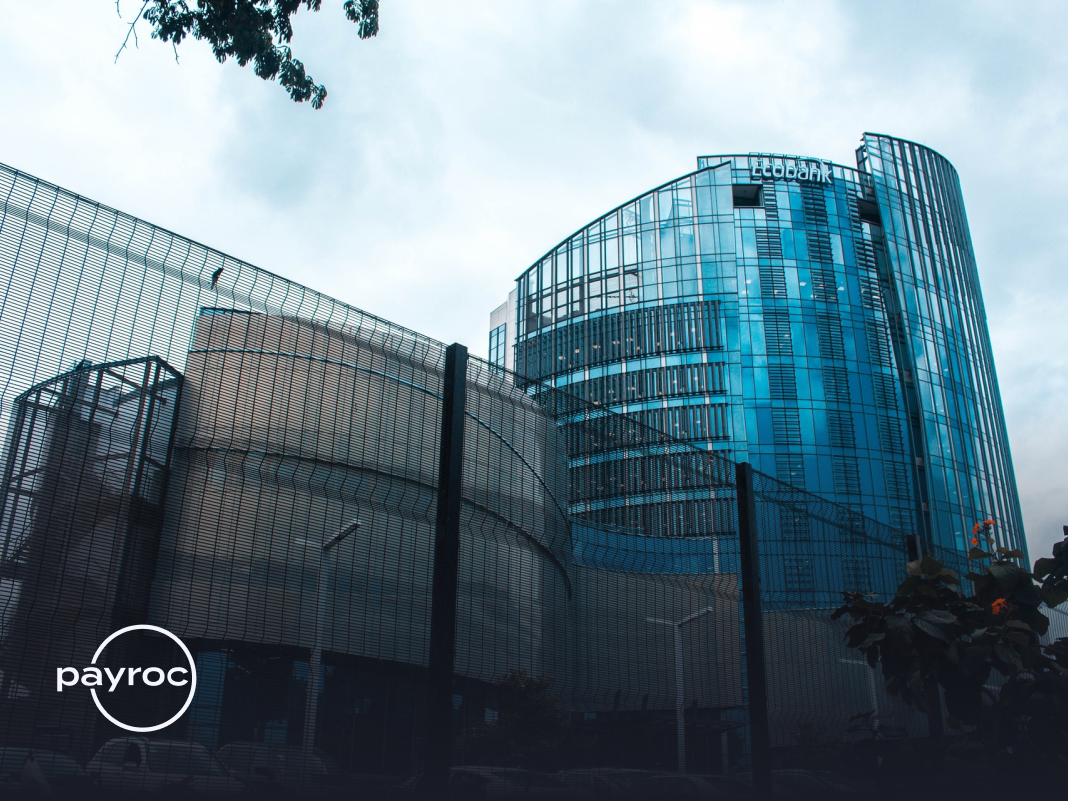 Modern office building with Payroc logo