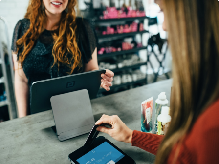A customer making a payment on a POS